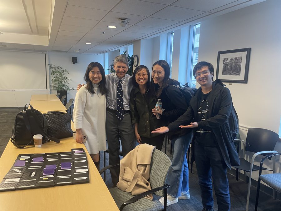 The lab meeting around a seminar table